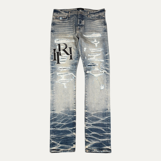 Amiri Lightwash Knee Spellout Jeans