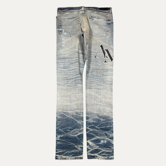 Amiri Lightwash Knee Spellout Jeans